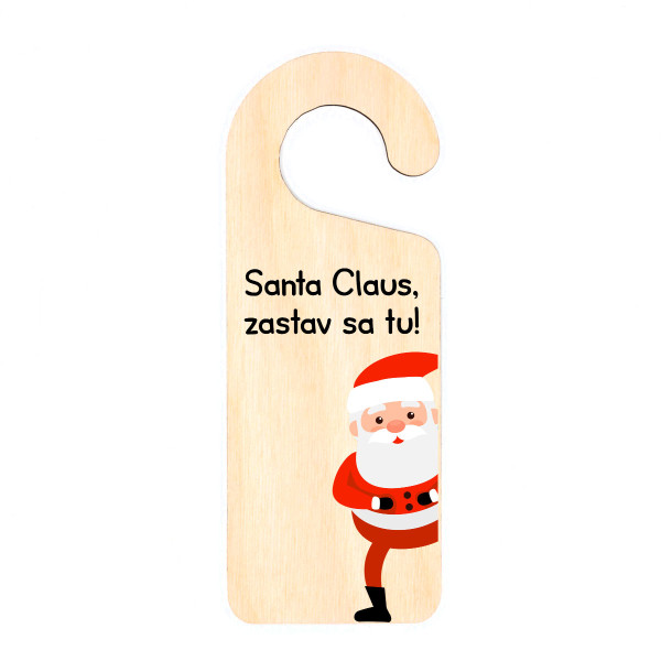 Zavesená drevená tabuľka na dverách "Santa Claus, zastav sa tu"